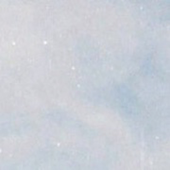 The same close-up after DustSol: the scratch is gone and the grain continues