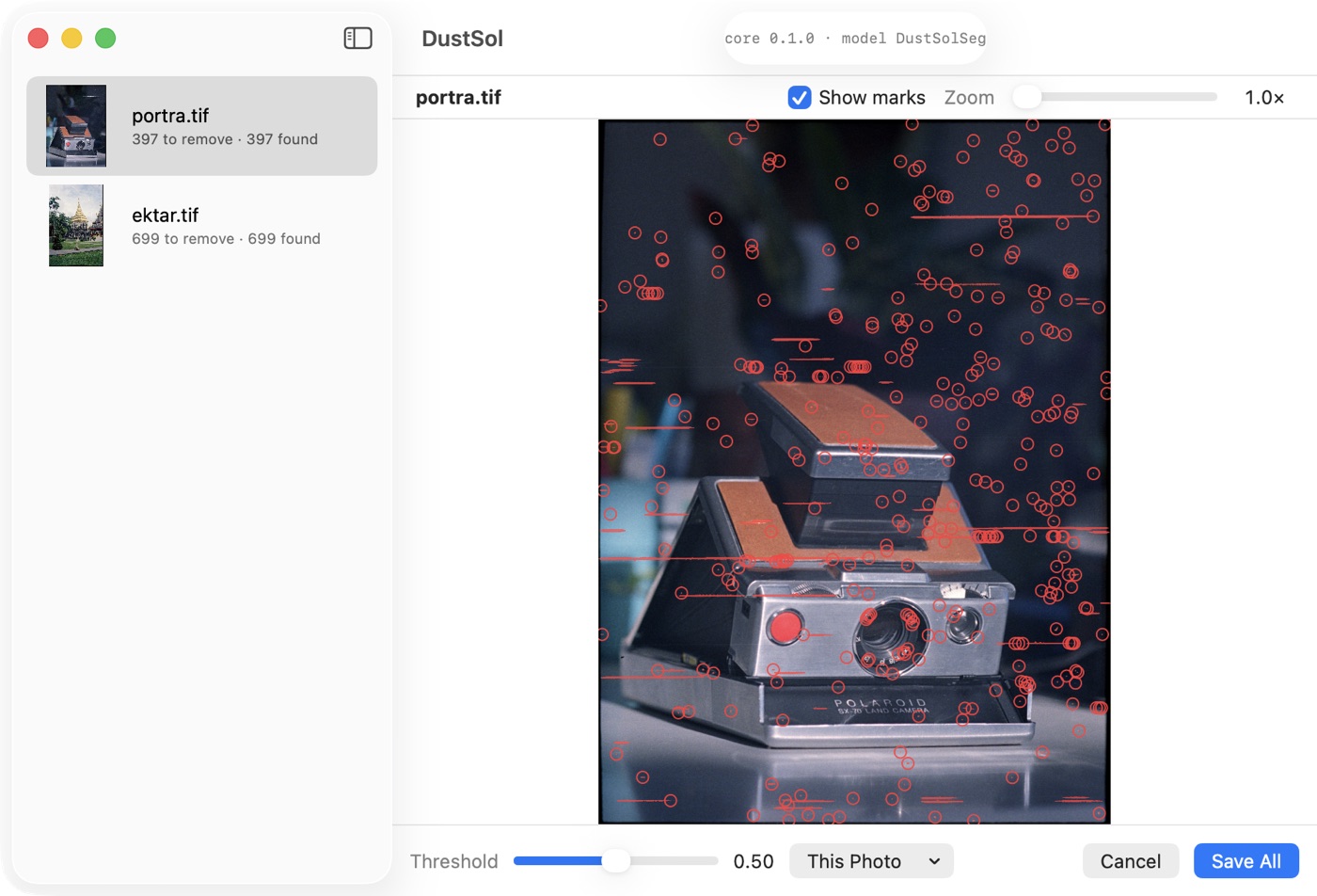 The DustSol review window: a list of photos on the left, and a scan with dust and scanner streaks marked in red